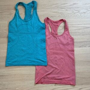 Lululemon blue and peach/pink racerback tank tops. Size 4